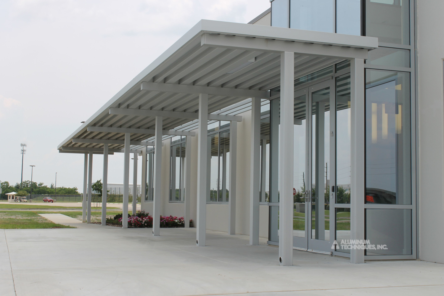 Showing an aluminum outdoor walkway cover.